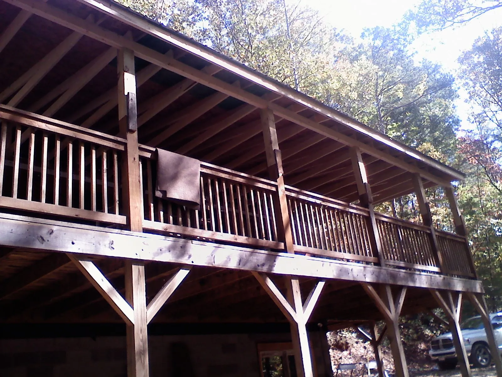 Timber framing under a new elevated porch and deck — Roof Leak Repair in Diamond by Roofing Brothers